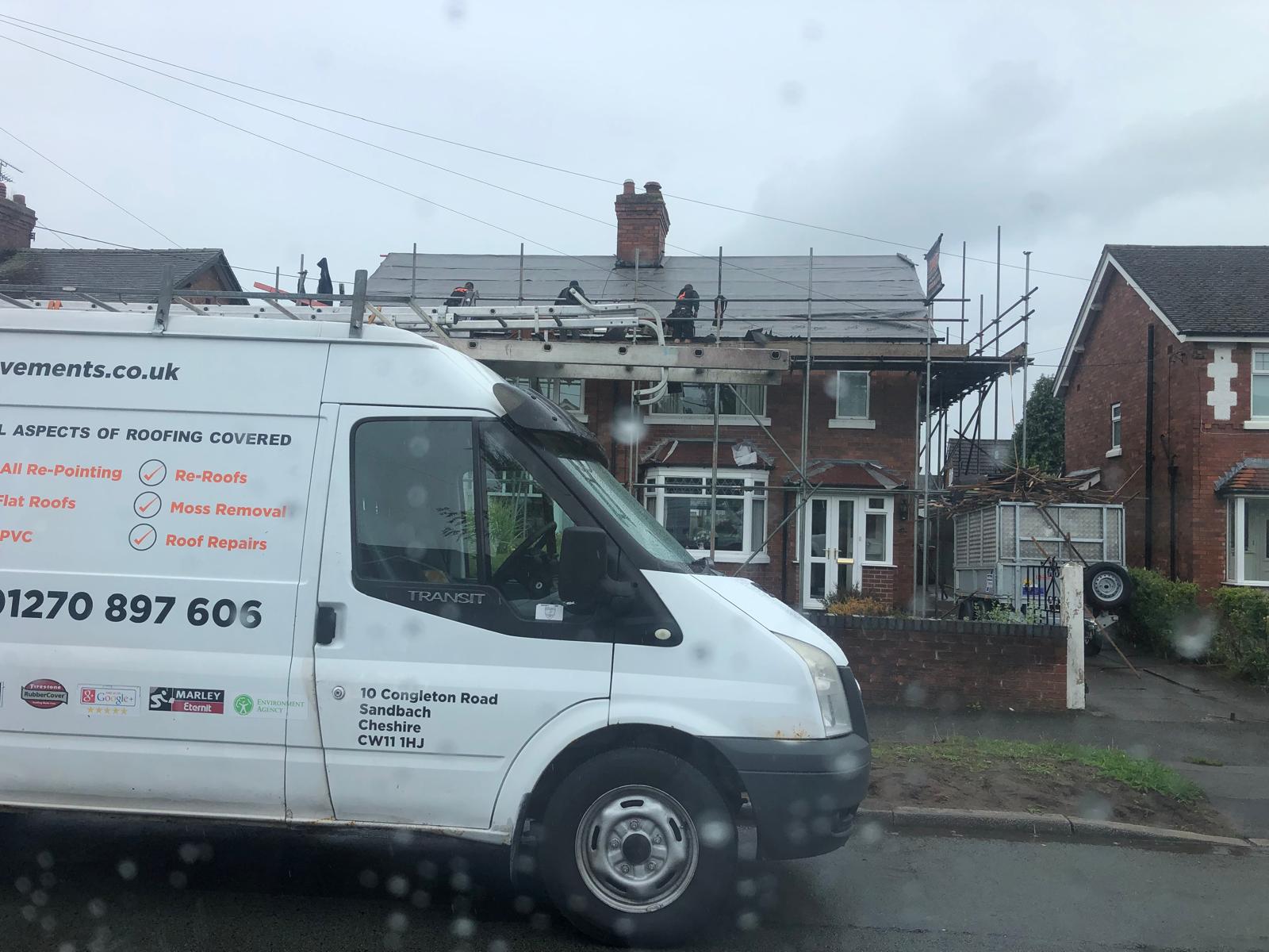 Professional roofing team at work